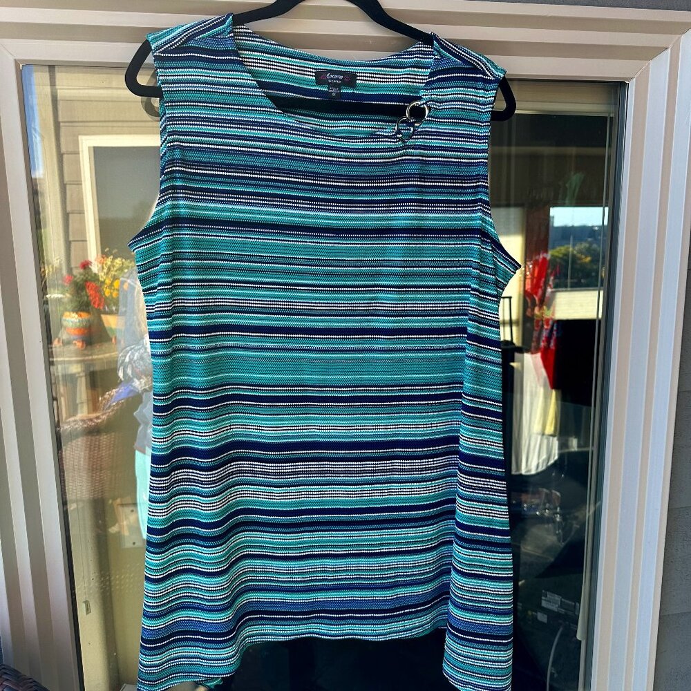 Slinky sleeveless tunic with rings at neckline